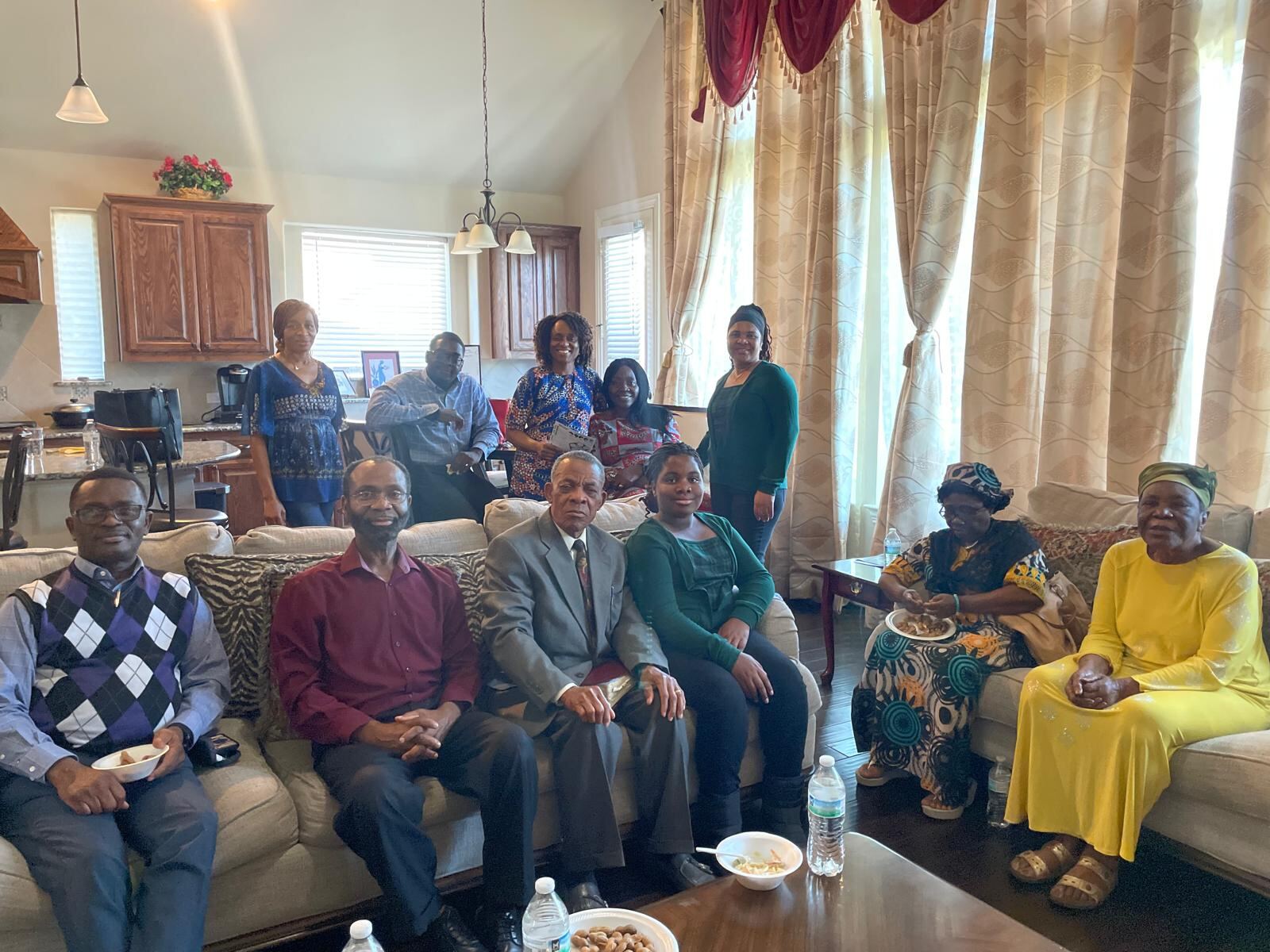 ACF Dallas members gathered in a living room for home fellowship