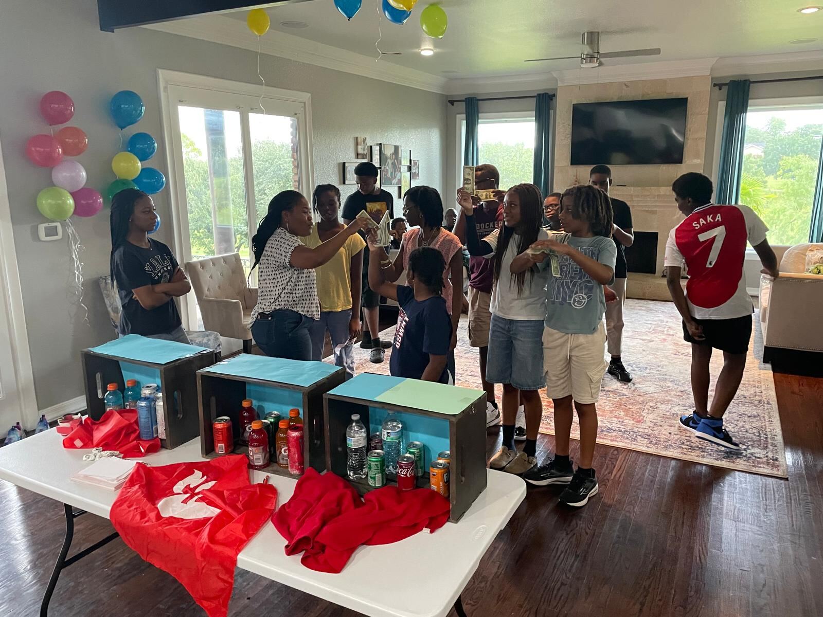 Young people laughing together at a chapter youth party